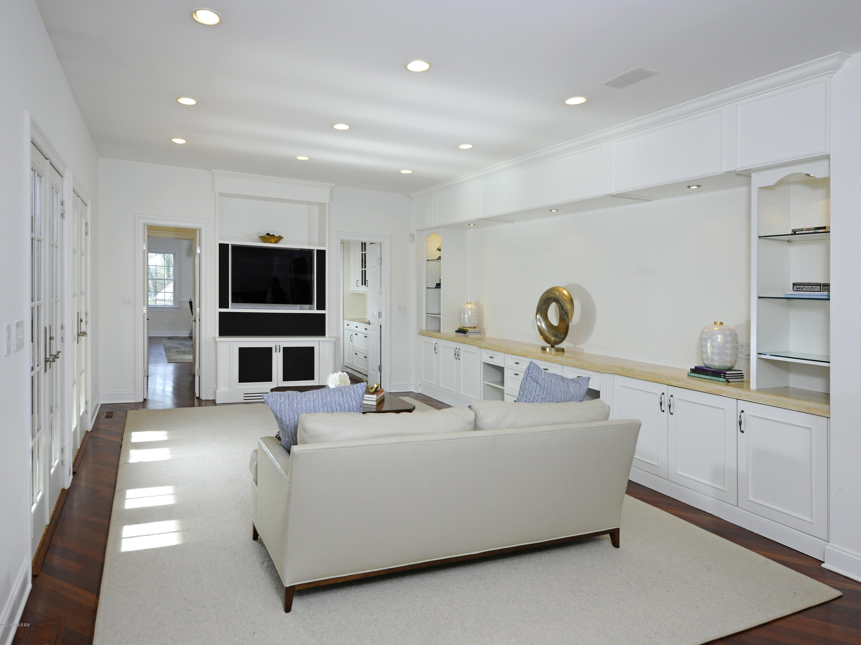 34 Hendrie Avenue Riverside, CT 06878 - Photo 8 of 28 a living room with furniture and flat screen tv