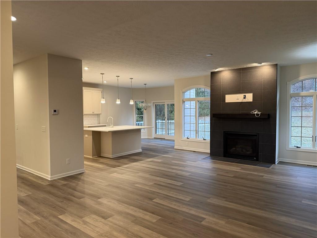 116 Brush Run Road Greensburg, PA 15601 - Photo 5 of 29 a view of a kitchen with a sink and a fireplace
