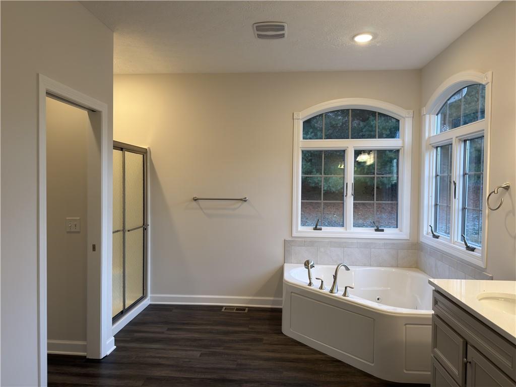 116 Brush Run Road Greensburg, PA 15601 - Photo 9 of 29 a bathroom with a bathtub and a shower