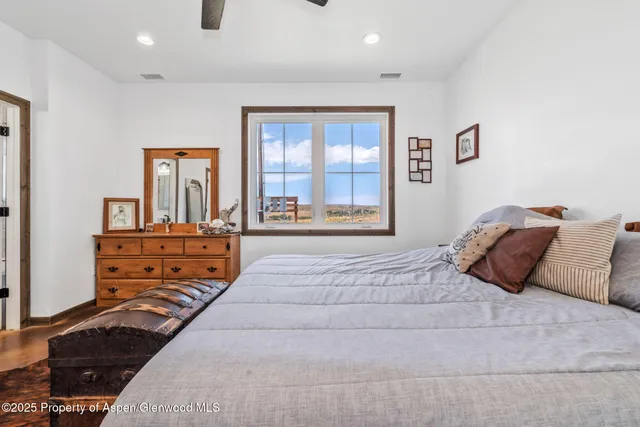 a bathroom with a tub and a shower