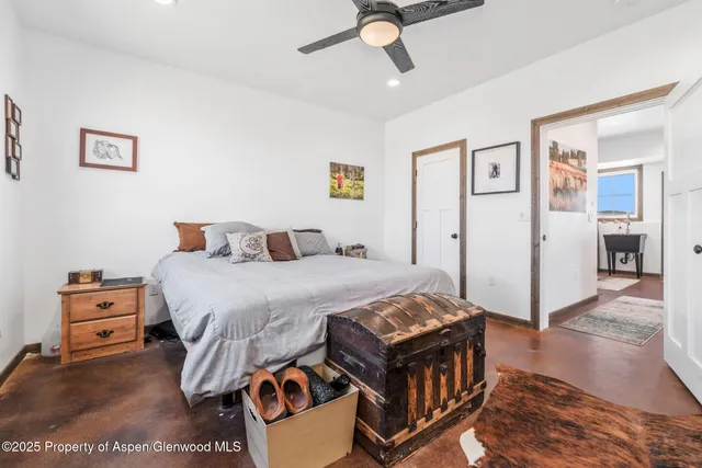 a view of a living room and a balcony