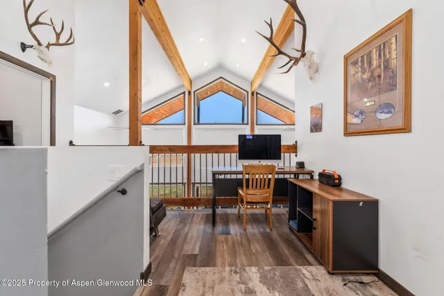 a bathroom with a sink toilet a shower curtain