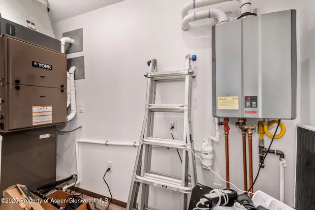 a view of a swimming pool with a lounge chair