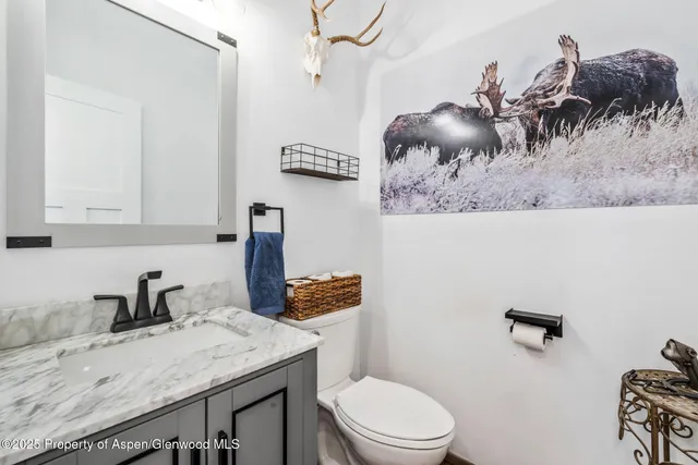 a kitchen with refrigerator and countertop