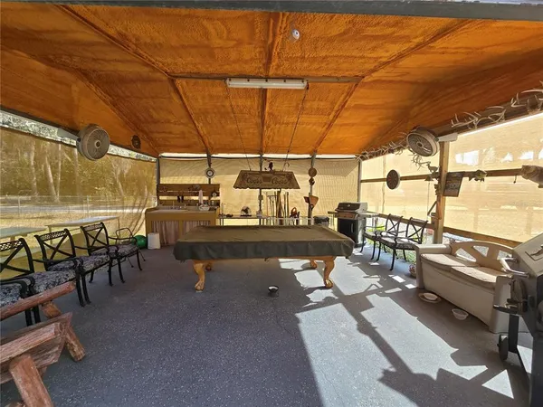 a view of outdoor space with deck and yard