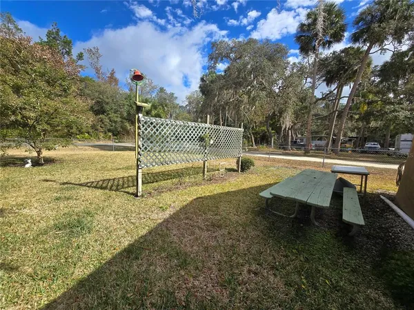 a view of house with patio