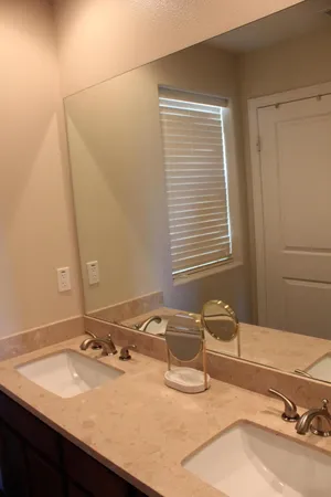 a bedroom with a bed and a table