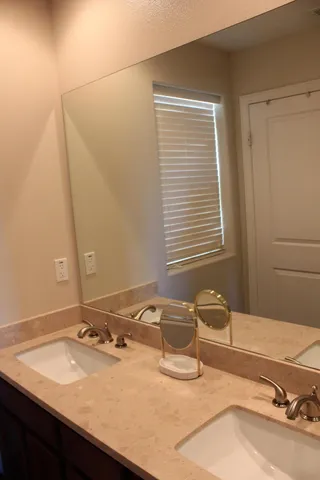 a bedroom with a bed and a table