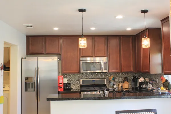 a bathroom with a toilet a sink and a mirror