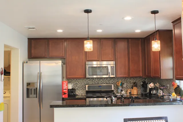 a bathroom with a toilet a sink and a mirror