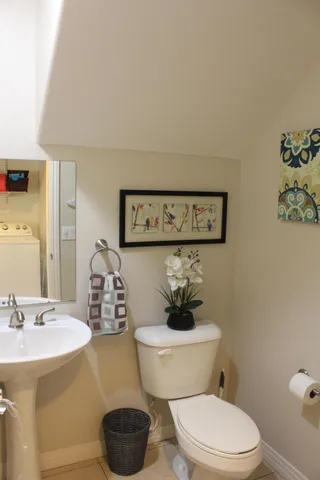 a living room with a flat screen tv and a fireplace