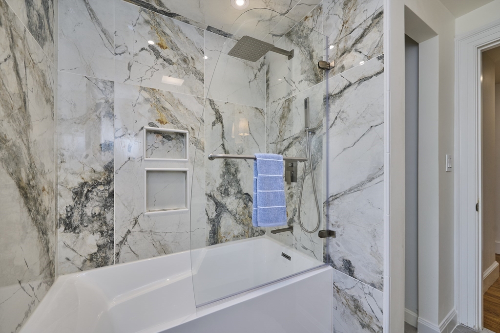 42 Troutbrook Road Dover, MA 02030 - Photo 18 of 36 a bathroom with a bathtub and shower