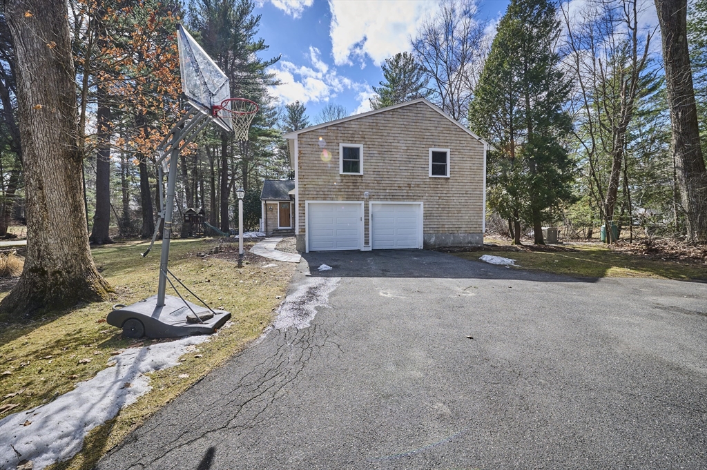 42 Troutbrook Road Dover, MA 02030 - Photo 2 of 36 a view of a house with a yard