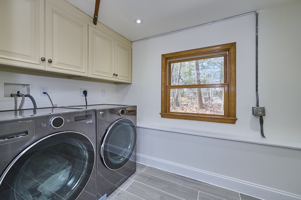 42 Troutbrook Road Dover, MA 02030 - Photo 31 of 36 a utility room with sink dryer and washer
