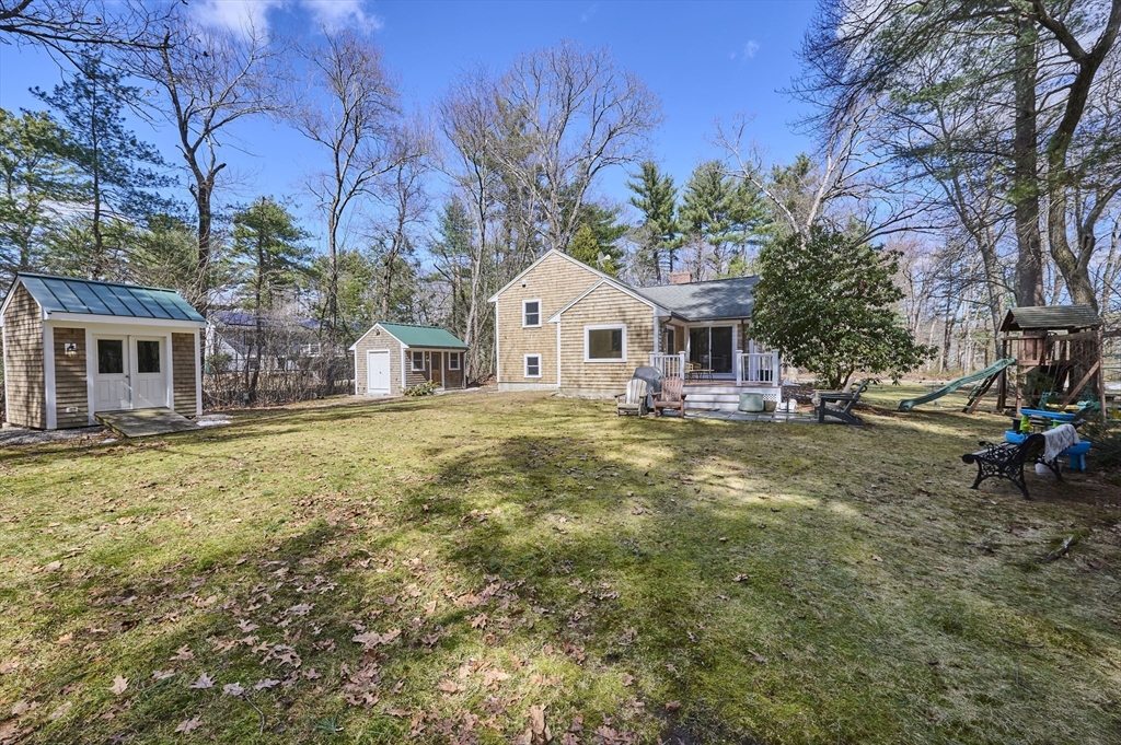 42 Troutbrook Road Dover, MA 02030 - Photo 33 of 36 a front view of a house with garden
