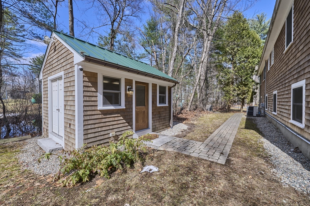 42 Troutbrook Road Dover, MA 02030 - Photo 36 of 36 a view of a house with a yard