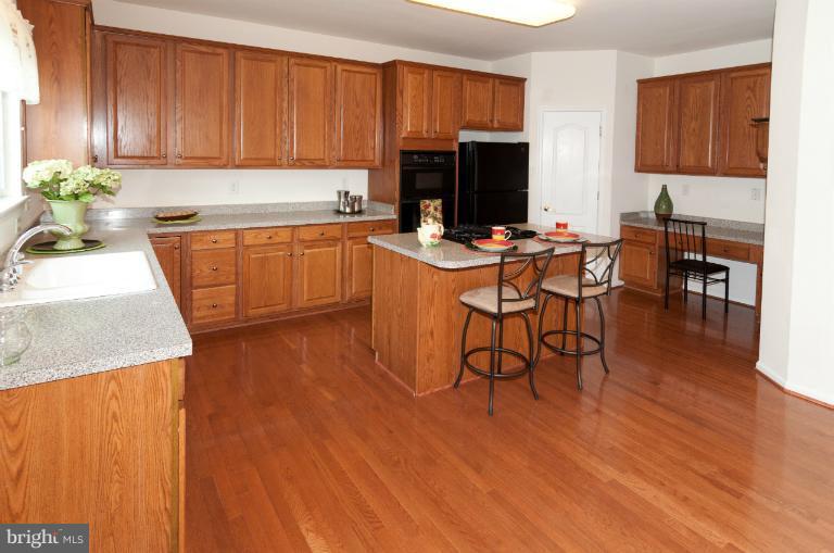 14305 Autumn Gold Road Boyds, MD 20841 - Photo 19 of 30 Gourmet Center Island Kitchen with Gas Cooking