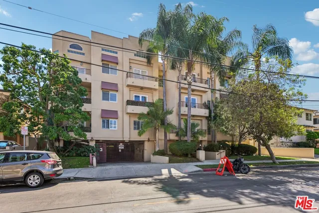 a front view of a building with street view