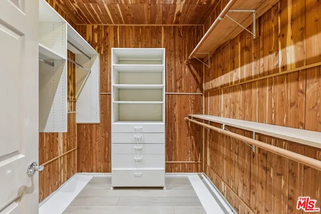 a bathroom with a granite countertop toilet a sink and a bathtub