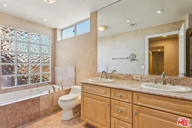a view of balcony with wooden floor and fence