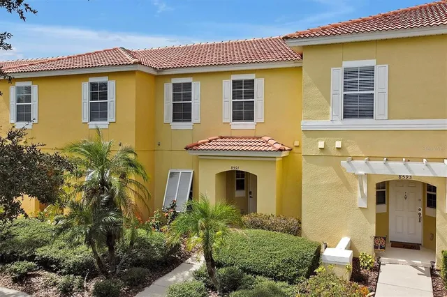 a view of an entryway with a floor to ceiling window
