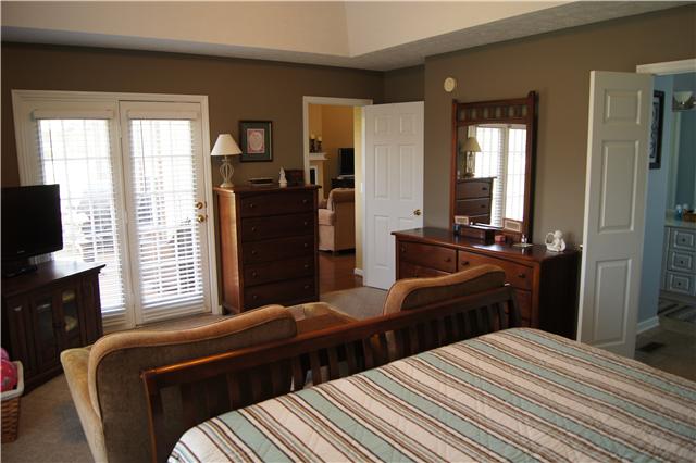 233 Savannah Ridge Murfreesboro, TN 37127 - Photo 10 of 20 Attached master bathroom with huge walk in closet, separate jacuzzi tub and shower, double sink vanity, ceramic tile floors