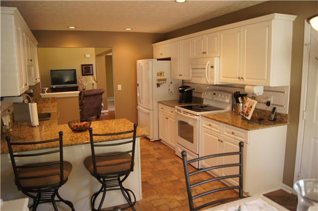 233 Savannah Ridge Murfreesboro, TN 37127 - Photo 7 of 20 Another view of the kitchen showing wrap around bar, also offers nice new appliances
