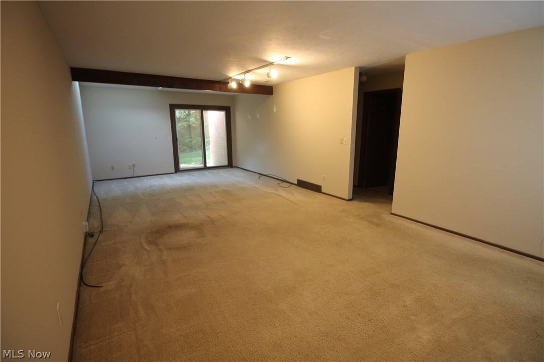4695 Mayfield Road, Unit D South Euclid, OH 44121 - Photo 6 of 22 Dining room flowing in to Living room, exiting to patio