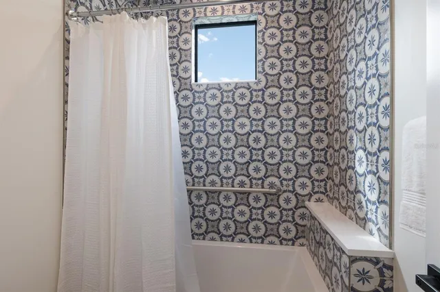 a bedroom with a bed and furniture