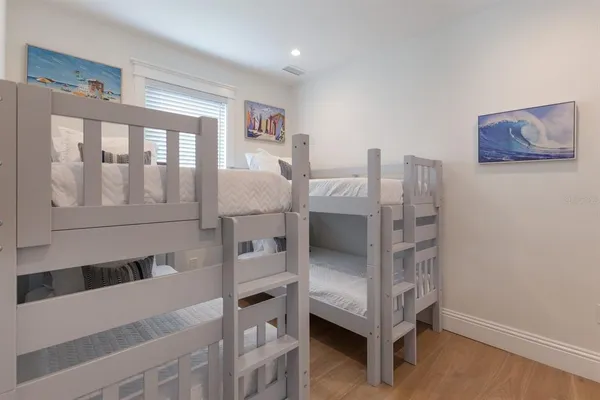a room with a bed and a view of bathroom