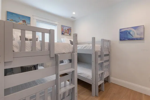 a room with a bed and a view of bathroom