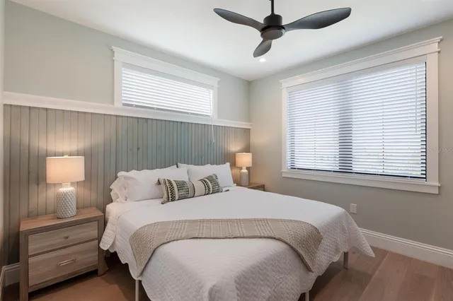 a front view of house with a garden