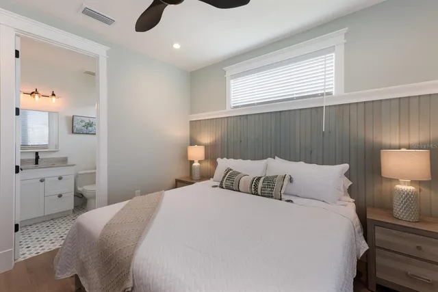 an aerial view of multiple houses with yard