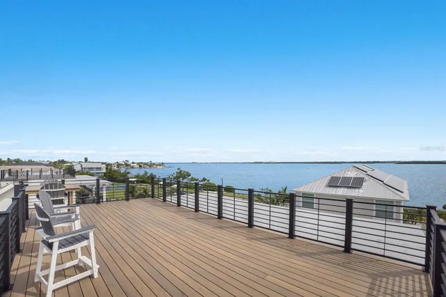 a view of a house with a clock and a clock on the wall