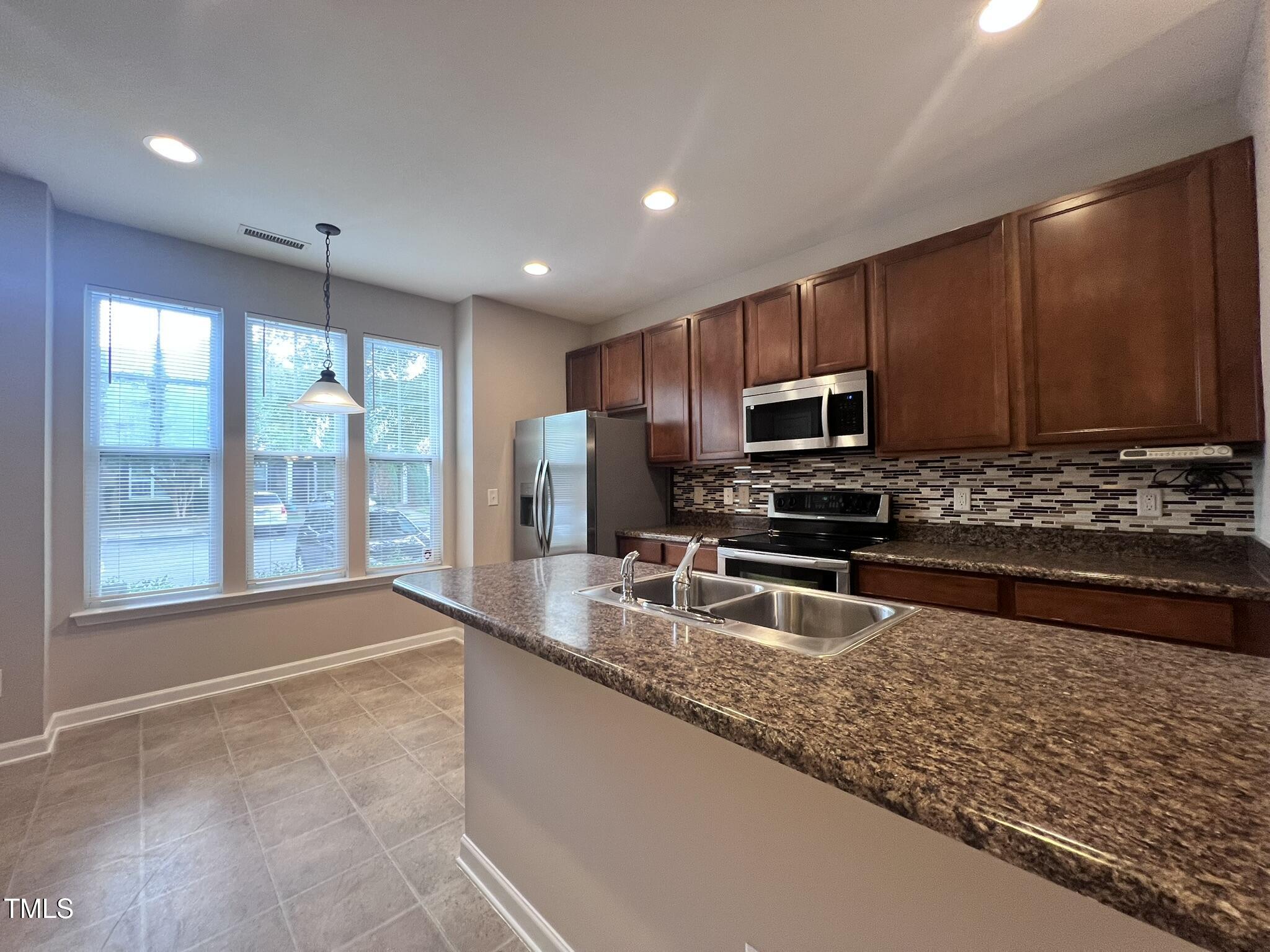 6635 Clarksburg Place Raleigh, NC 27616 - Photo 9 of 31 IMG_4347