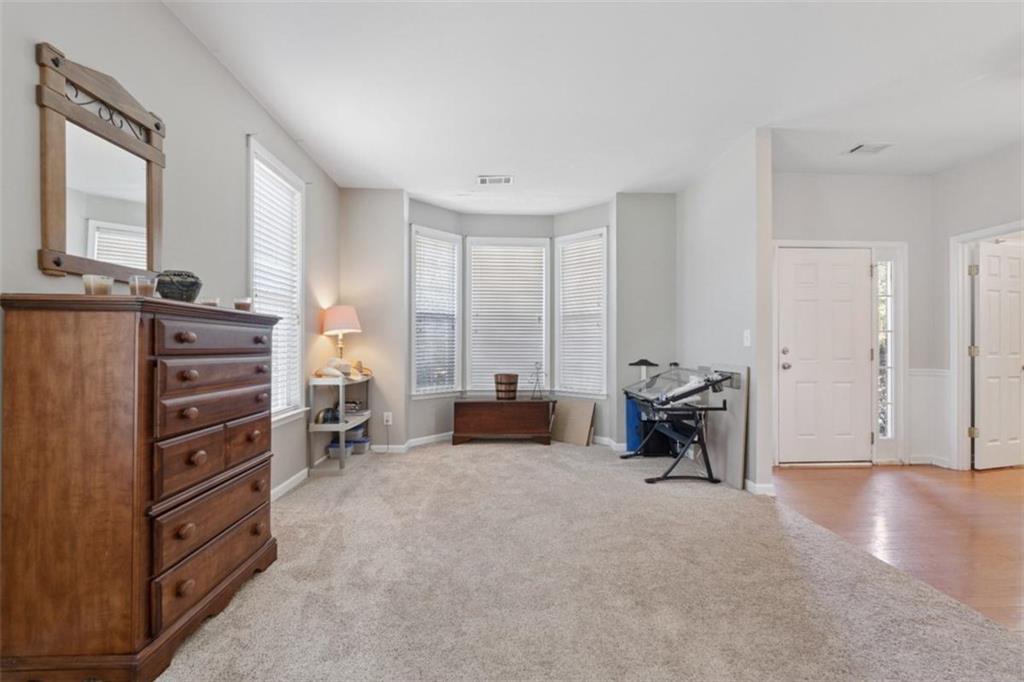 2747 High Creek Run Dacula, GA 30019 - Photo 7 of 48 a view of workspace with furniture and windows