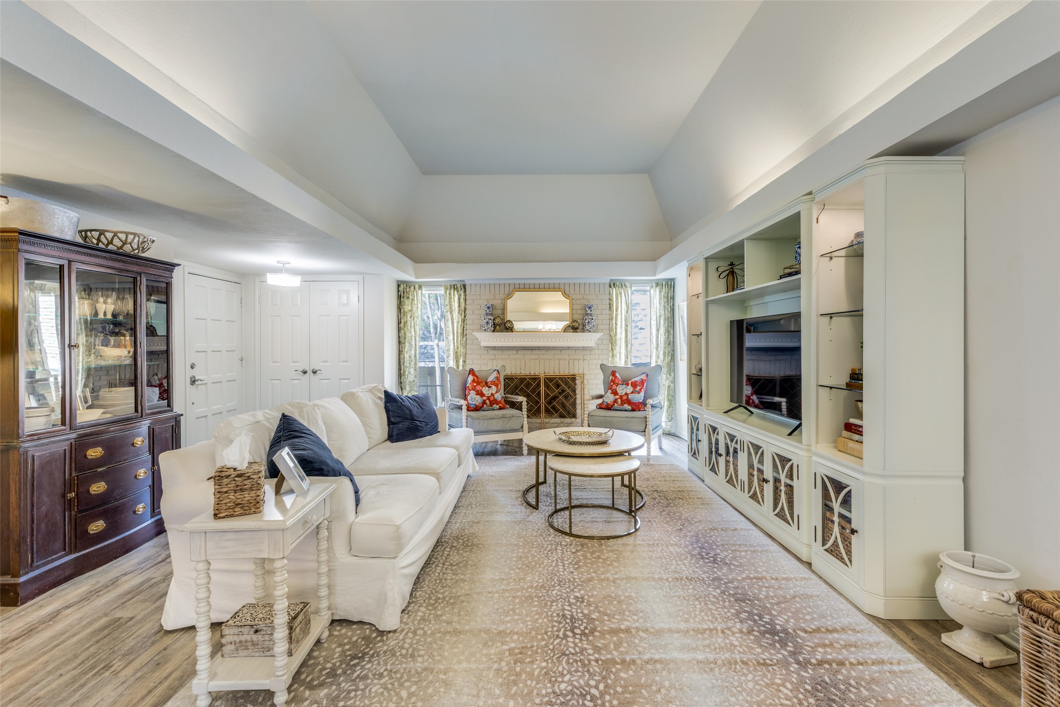 3201 Pecos Street, Unit 1 Austin, TX 78703 - Photo 2 of 25 Nice fireplace and bookshelves