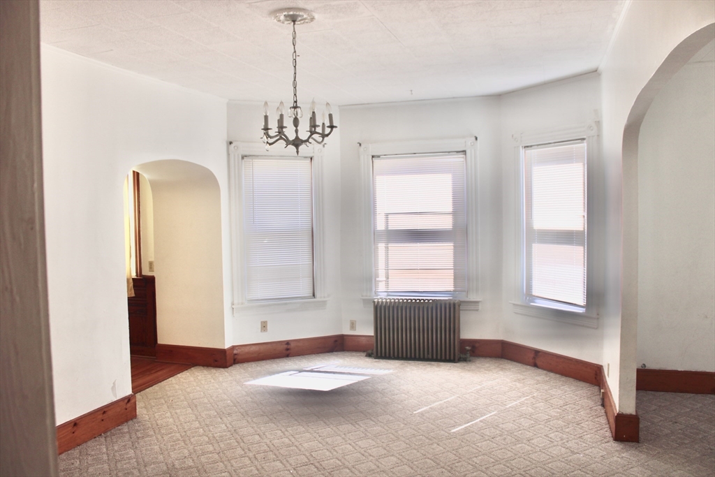 136 Horton Street, Unit 1 Fall River, MA 02723 - Photo 6 of 17 a view of an empty room with a window