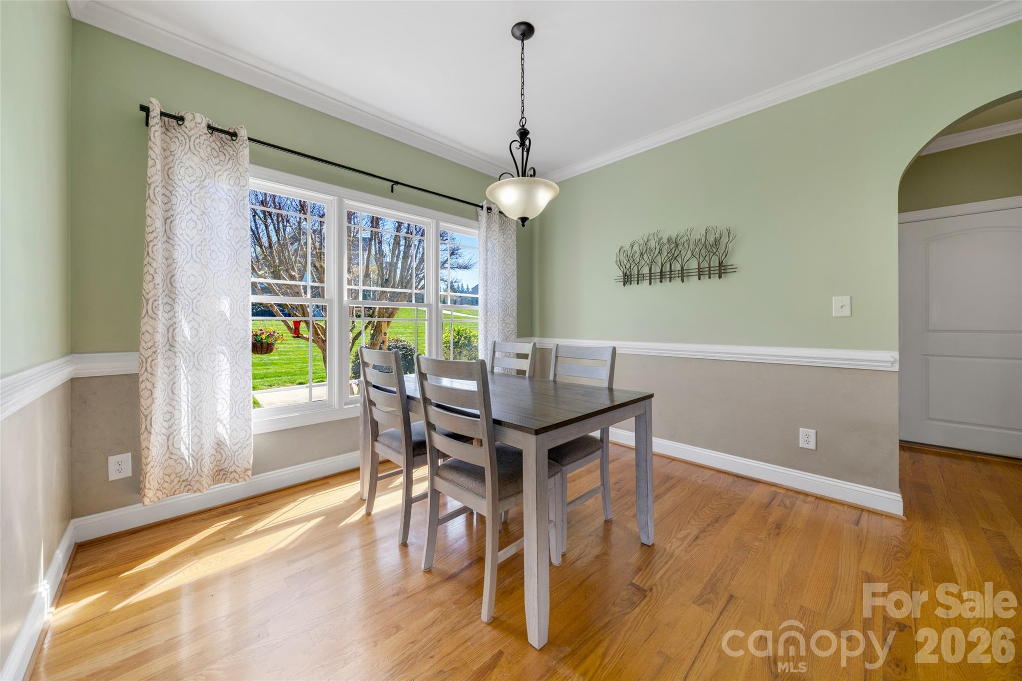 5873 Bakers Point Hickory, NC 28602 - Photo 13 of 48 a view of a dining room with furniture window and wooden floor