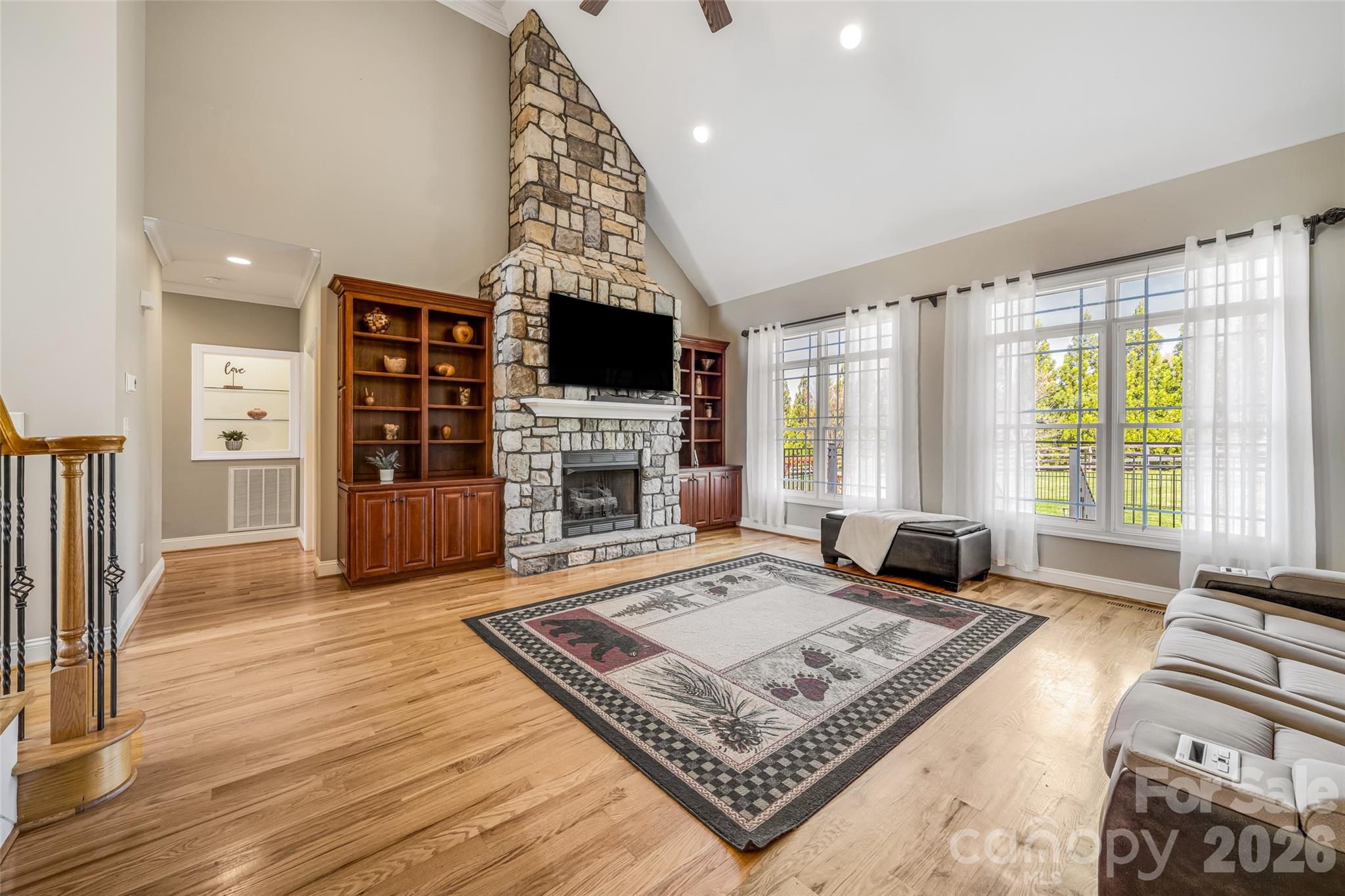 5873 Bakers Point Hickory, NC 28602 - Photo 16 of 48 a living room with furniture and a flat screen tv