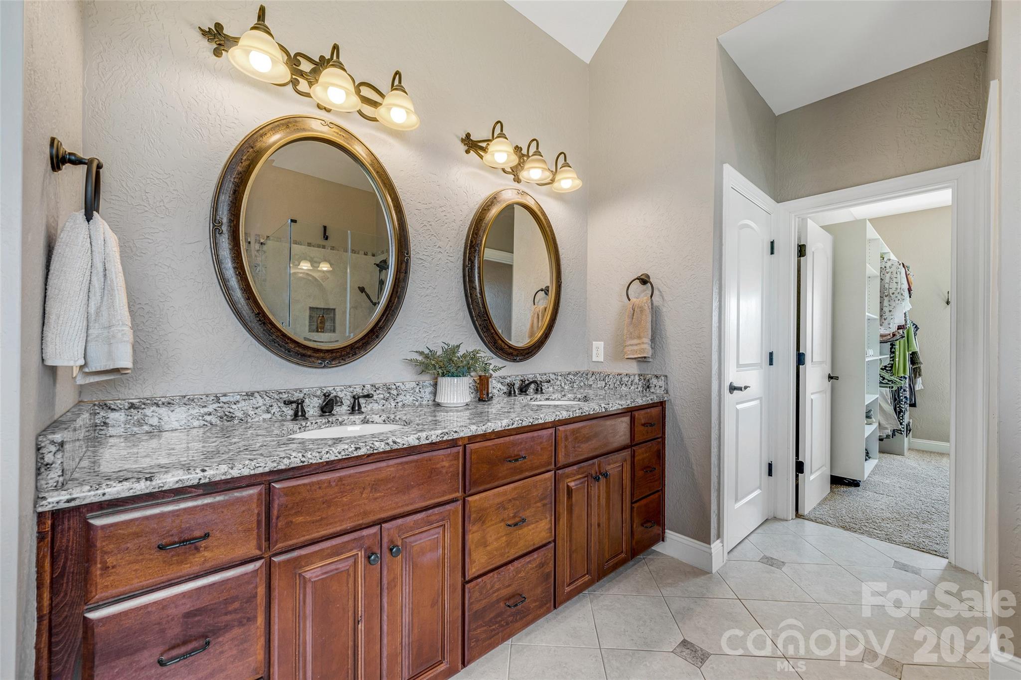 5873 Bakers Point Hickory, NC 28602 - Photo 20 of 48 a bathroom with a granite countertop double vanity sink and a mirror