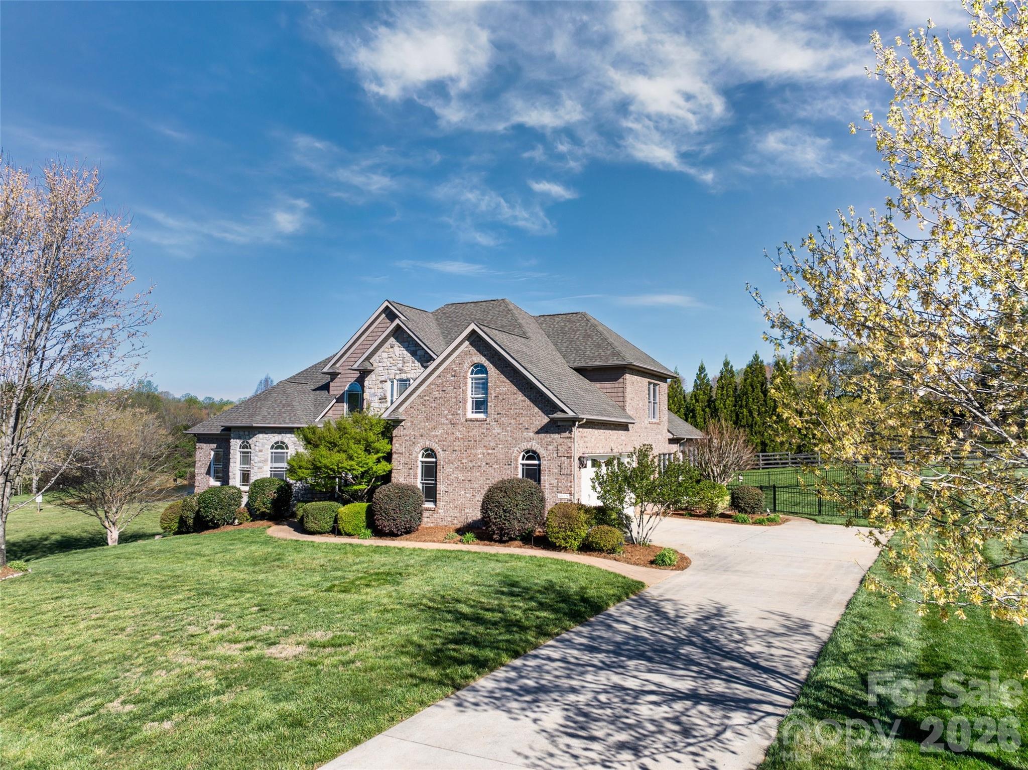 5873 Bakers Point Hickory, NC 28602 - Photo 2 of 48 a front view of a house with a yard