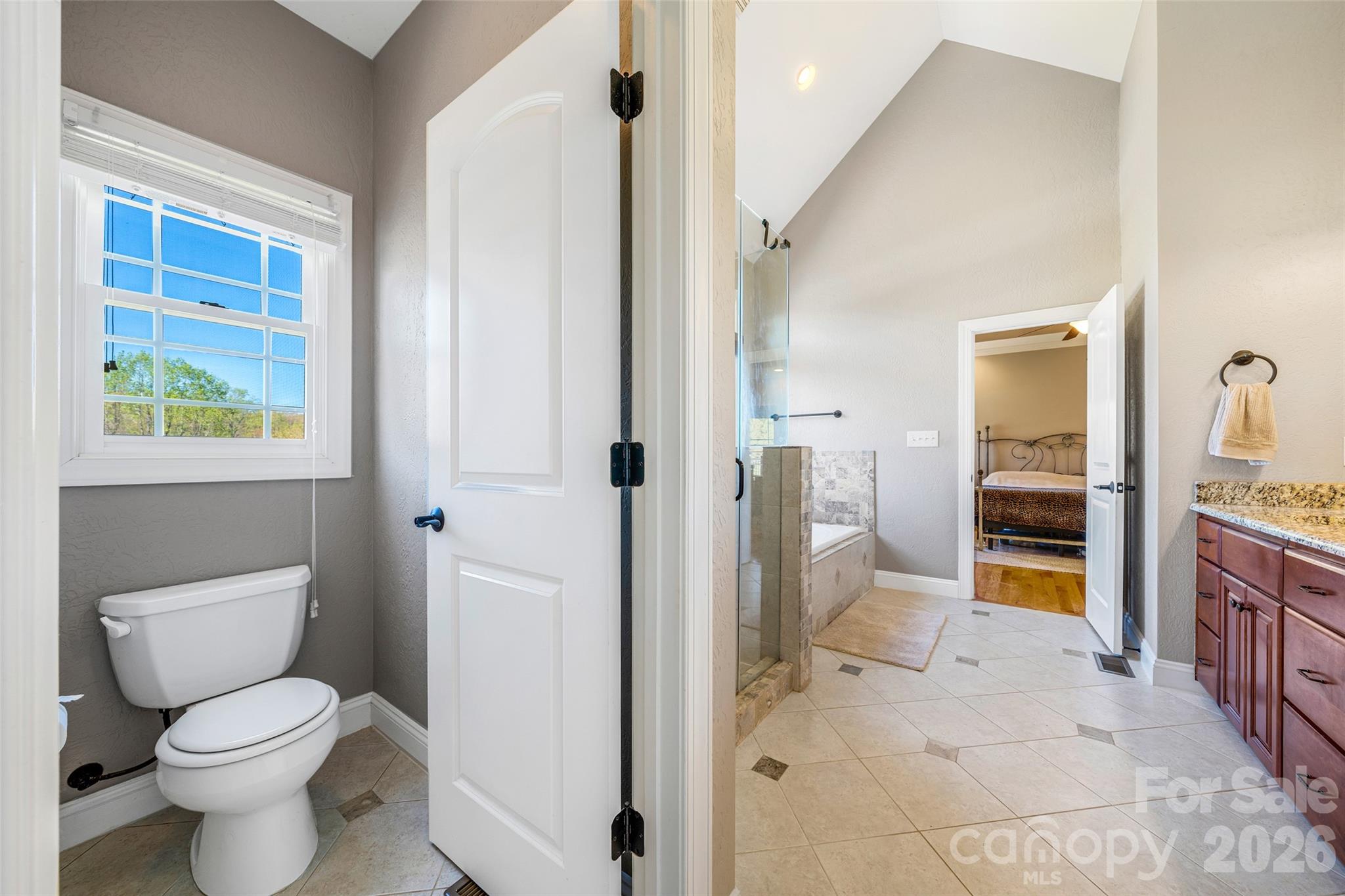 5873 Bakers Point Hickory, NC 28602 - Photo 21 of 48 a bathroom with a toilet sink and a shower