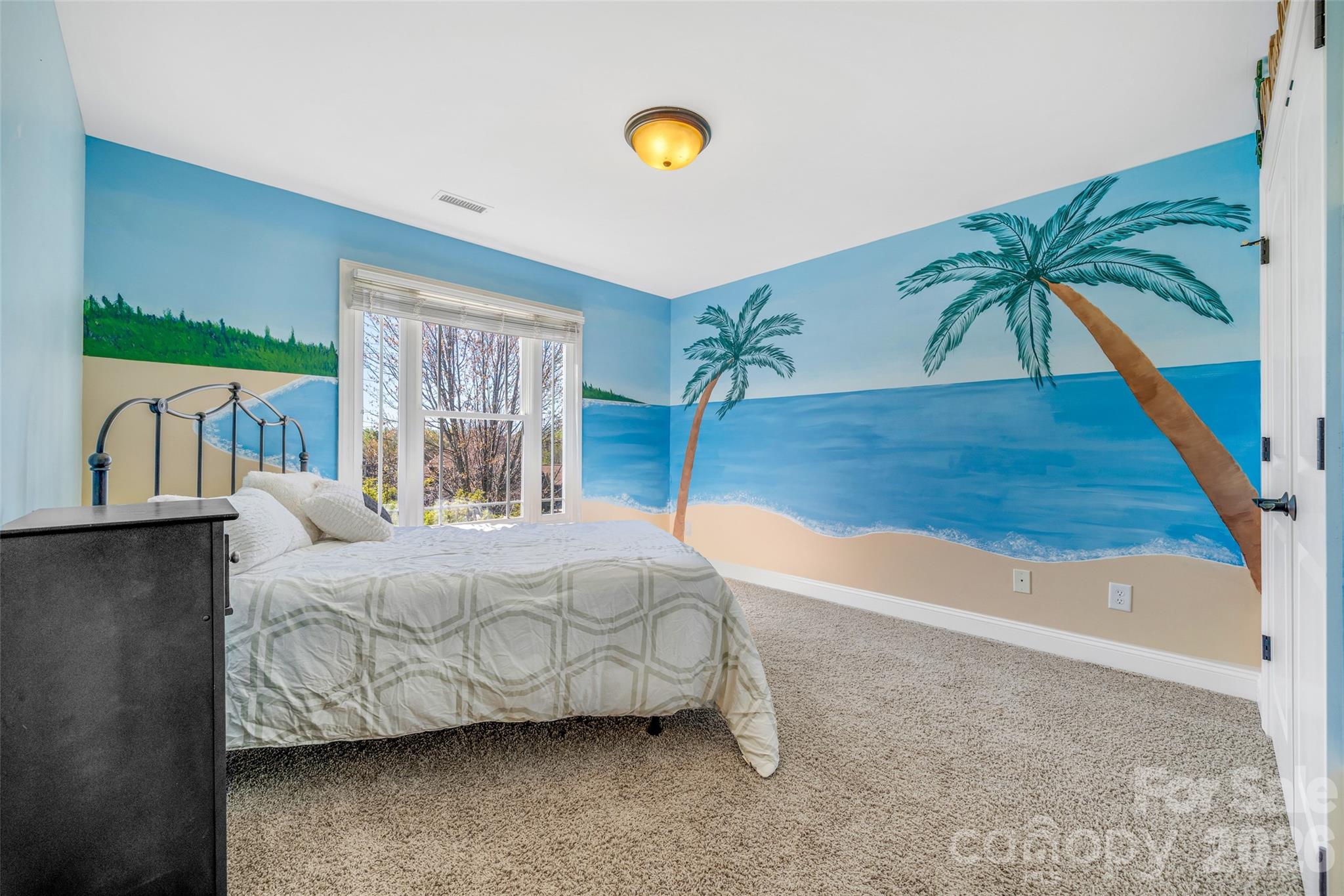 5873 Bakers Point Hickory, NC 28602 - Photo 27 of 48 a bedroom with a bed and a potted plant