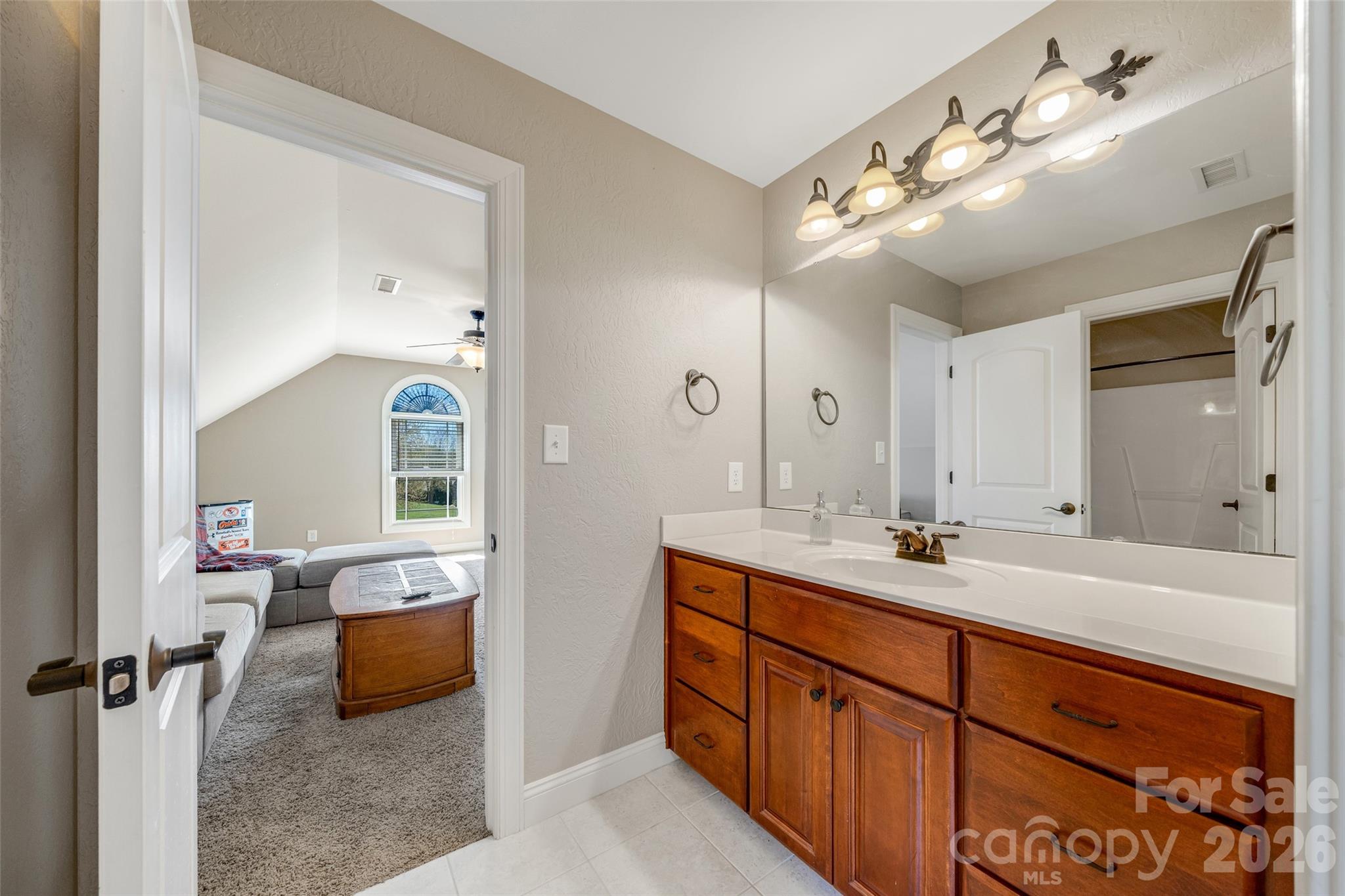 5873 Bakers Point Hickory, NC 28602 - Photo 30 of 48 a spacious bathroom with a double vanity sink mirror and bathtub