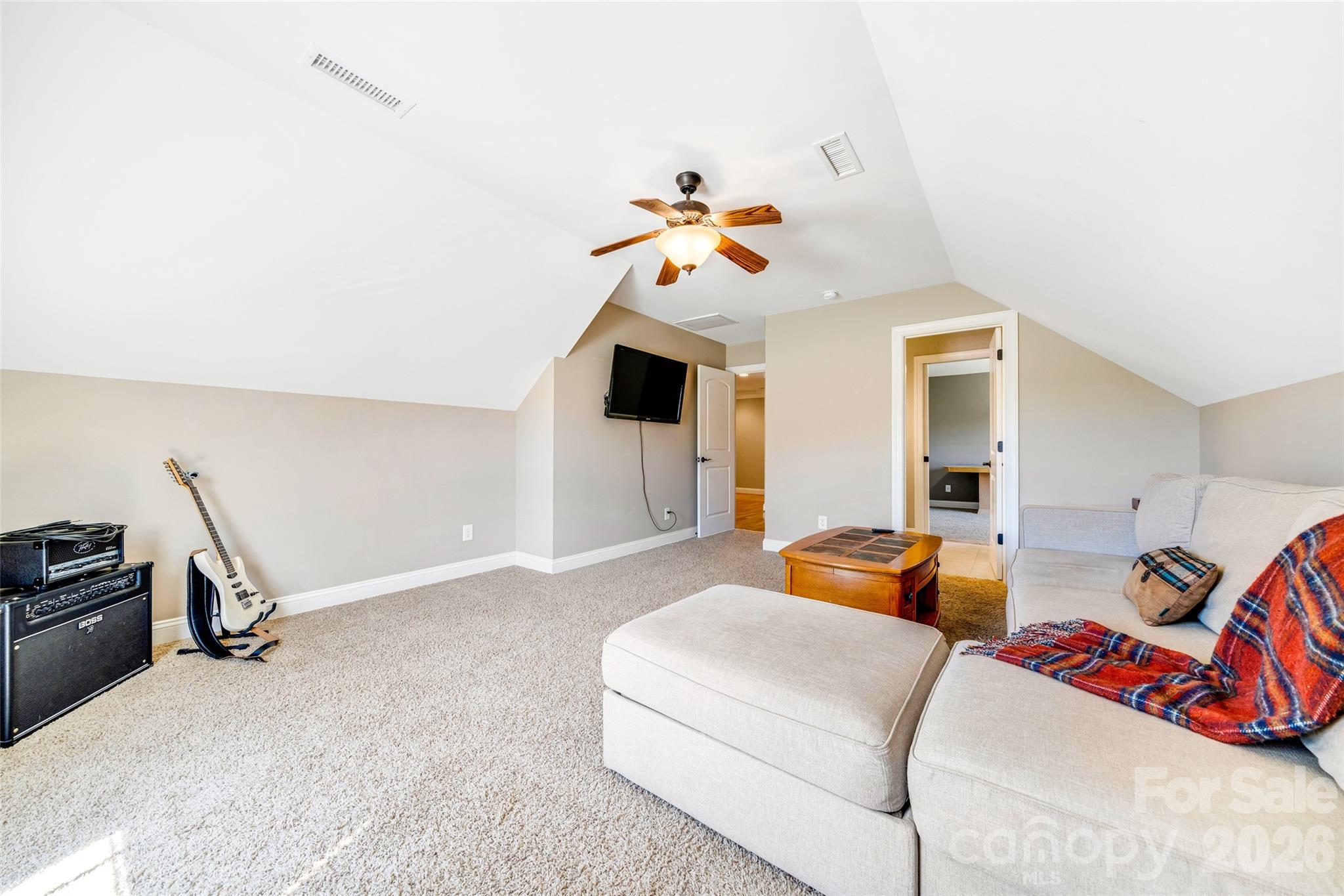 5873 Bakers Point Hickory, NC 28602 - Photo 33 of 48 a bedroom with two beds and a chandelier