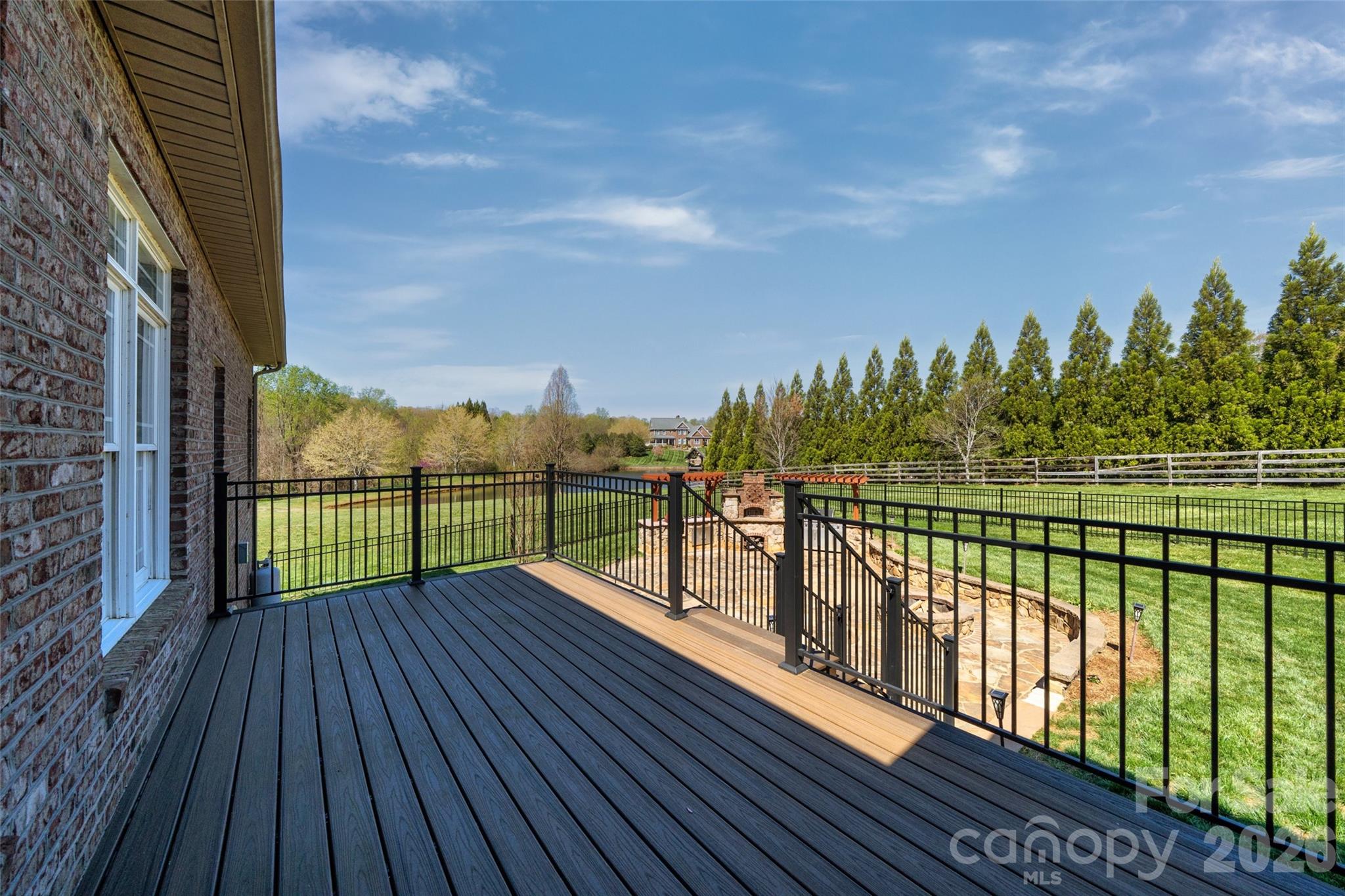 5873 Bakers Point Hickory, NC 28602 - Photo 45 of 48 a view of a balcony with wooden floor