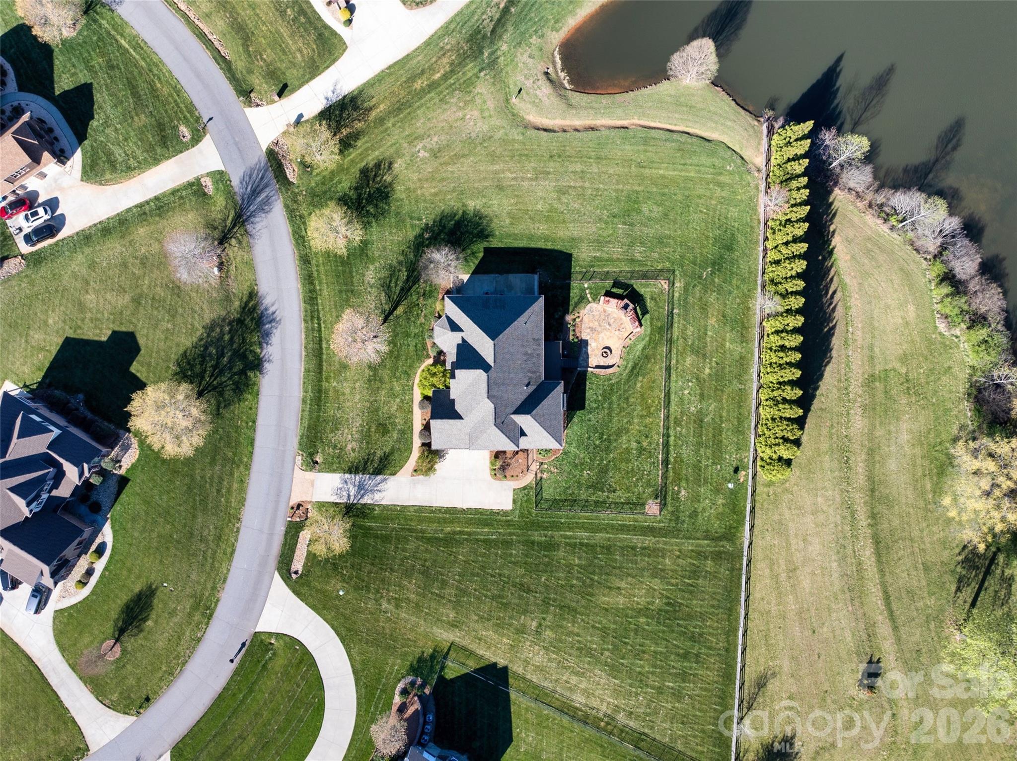 5873 Bakers Point Hickory, NC 28602 - Photo 48 of 48 an aerial view of a house with outdoor space pool seating area and yard