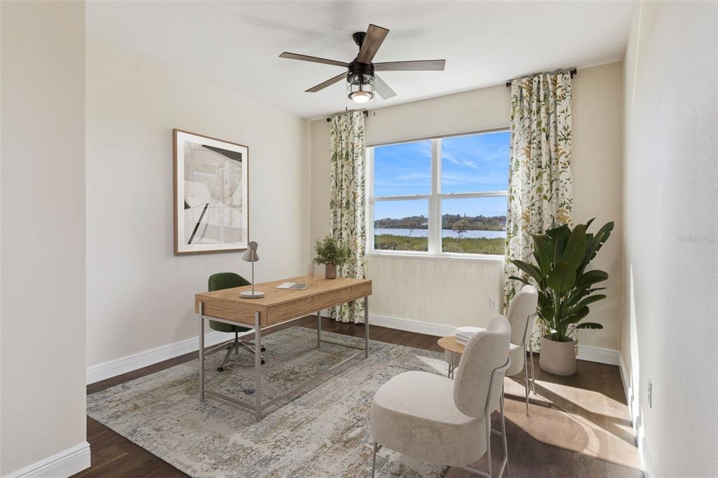 9009 Palm Key Avenue Oldsmar, FL 34677 - Photo 14 of 43 a living room with furniture a window and a potted plant