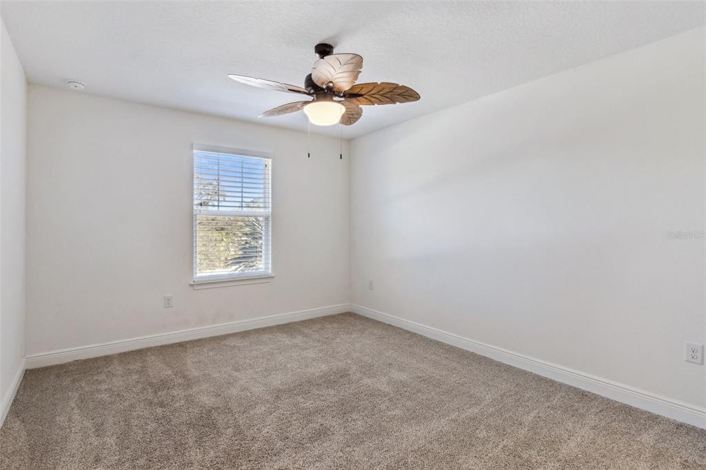 9009 Palm Key Avenue Oldsmar, FL 34677 - Photo 24 of 43 an empty room with a window